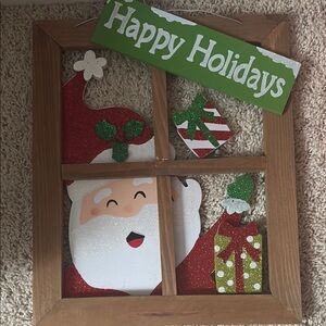 Festive Santa Window Decoration with Green Accents